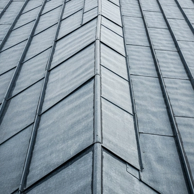 Detailed close-up of traditional zinc roofing elements on an old building in Angoulême, showcasing craftsmanship and durability
